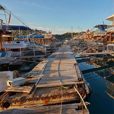 Marina dock with missing planks